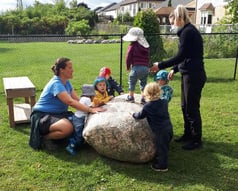 toddlers on boulder